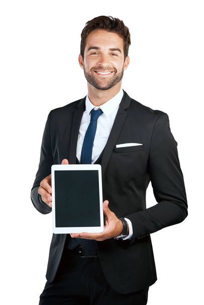 Technology is the way to go to market your business. Studio shot of a handsome young businessman posing against a white background - Foto, immagini