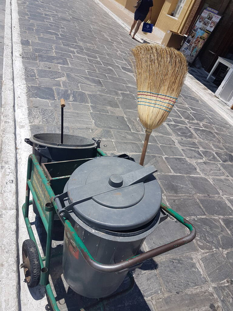 andros island andros city in greece, broom dustbins dustma - Foto, imagen
