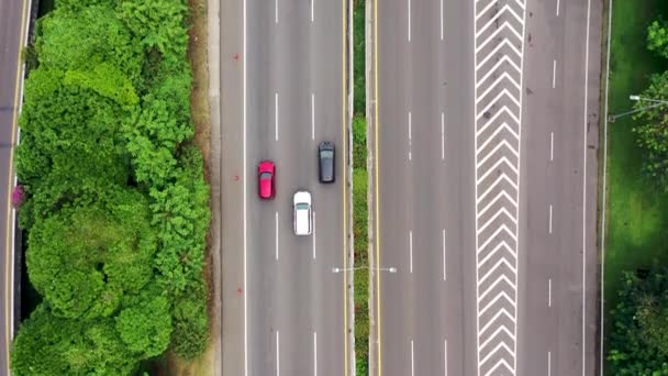 Top down view of rush hour on the road with cars moving slowly during traffic jam. - Video