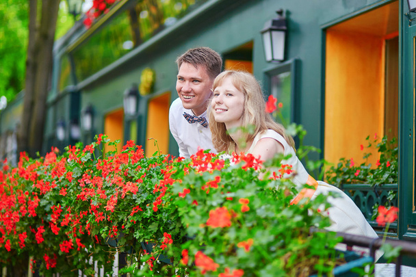 Young couple on a balcony of their house - Foto, Imagem