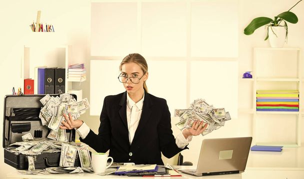 Bank worker. Thirst for profit. Motivation. Black cash. Financial insurance. Banking concept. Investing money. Richness and wellbeing. Personal accountant. Credit money. Security cash money savings. - 写真・画像