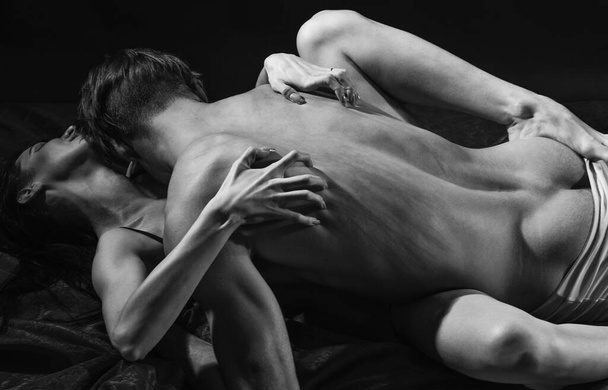 sensual couple in love of girlfriend and boyfriend lovers having sex foreplay with undressed sexy body, passion. - Foto, imagen