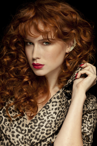 beautiful sexy red-haired girl pantera coat - Foto, Bild