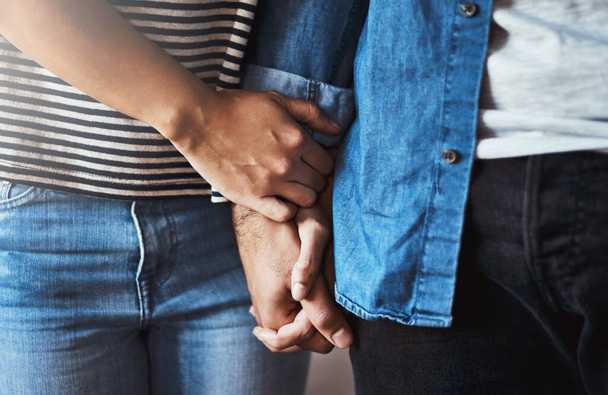 Were a team. an unrecognizable couple holding hands - Фото, зображення