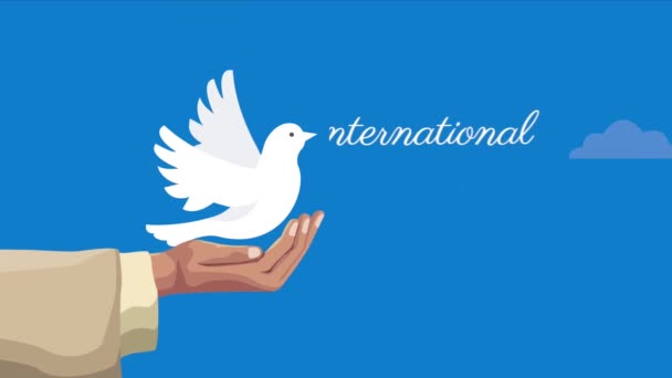 internationale dag van vrede belettering met duif, 4k video geanimeerd - Video