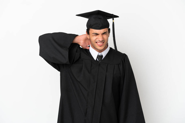 Young university graduate over isolated white background with neckache - Photo, Image