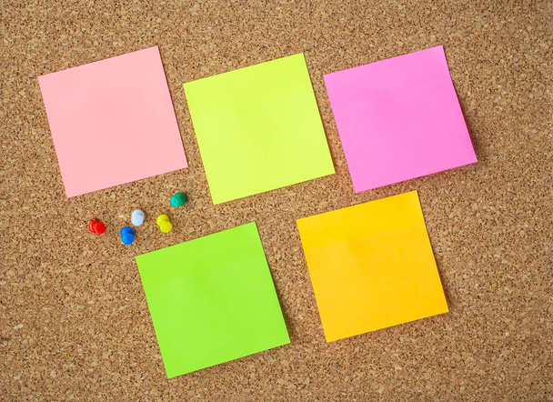Collection of various note papers on corkboard - Photo, Image