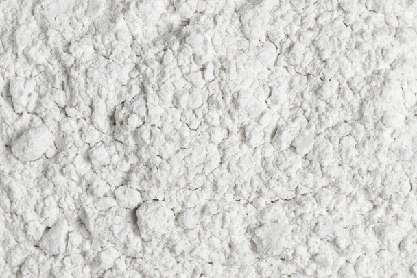 Organic white wheat flour. Top view, full frame photo. - Foto, afbeelding