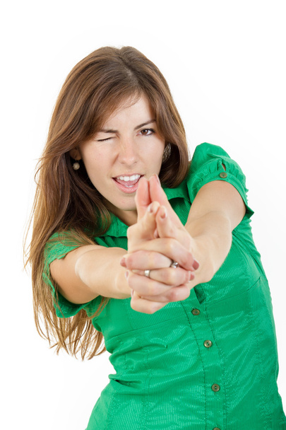 Νεαρή γυναίκα με σαγηνευτικό βλέμμα που καθιστά με χέρια δάχτυλα σημάδι l - Φωτογραφία, εικόνα