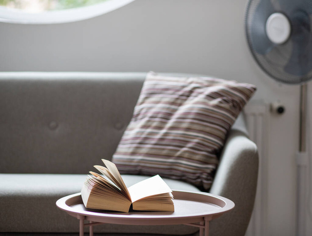 open book on a living room table - Photo, image