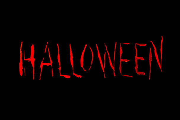 Word Halloween on black background. - Zdjęcie, obraz