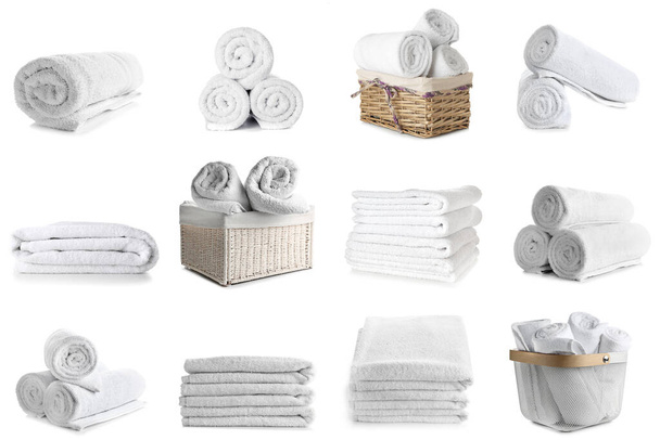 Set of clean soft towels isolated on white - Foto, imagen