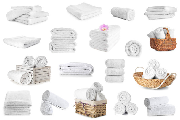 Set of clean soft towels isolated on white - 写真・画像