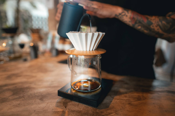 Closeup of hands barista make coffee,Drip coffee - Foto, imagen
