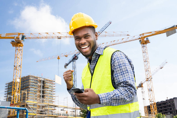 Excited Winner Construction Builder Worker Engineer Using Phone - Foto, Imagem