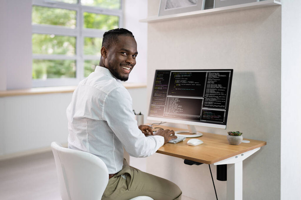 African American Coder Using Computer At Desk. Web Developer - Fotó, kép