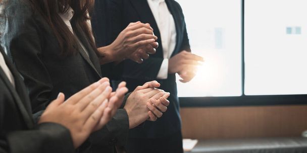 Photo of partners clapping hands after business seminar. Professional education, work meeting, presentation or coaching concept. - Foto, Imagen