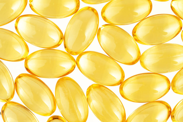 Close up of Omega 3 capsules on white background. Overhead. - Foto, imagen