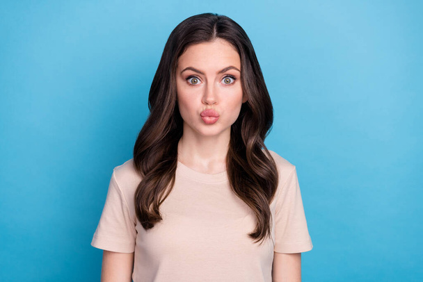 Portrait of funny nice lady send air kiss mouth pouted apply news pomade isolated sky light color background. - Foto, Bild
