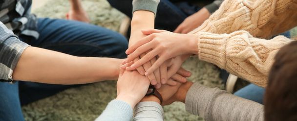 Group of people putting hands together, closeup - Photo, Image
