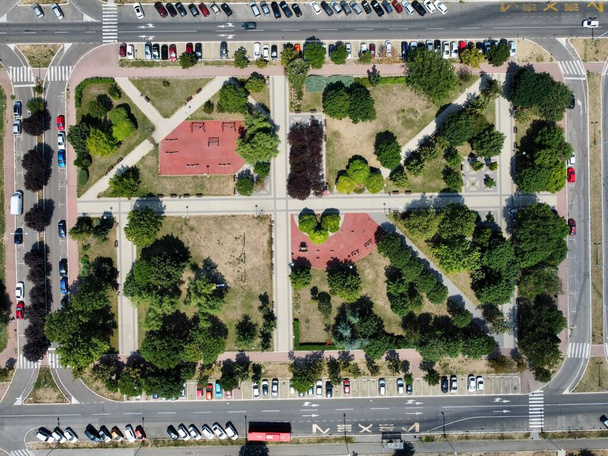 An aerial drone overview of the beautiful green open park on a sunny day in Novi Beograd, Serbia - Photo, Image