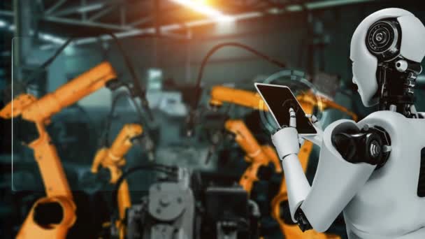 Кібернетичний промисловий робот і роботизована зброя для складання на заводі. Концепція штучного інтелекту промислової революції та процесу автоматизації
 . - Кадри, відео