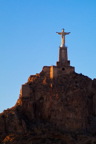 View of the sculpture of the Heart of Jesus in Monteagudo, which blesses the orchard of Murcia from above - 写真・画像