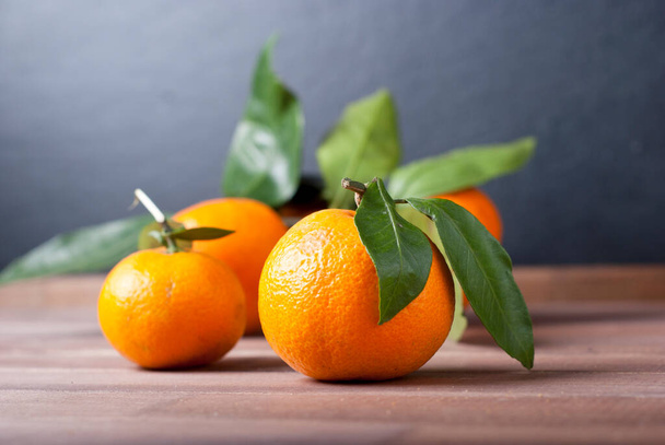 mandarins on wooden table - Zdjęcie, obraz