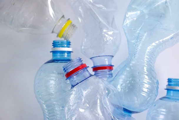 Used plastic bottle on a light background - Photo, Image