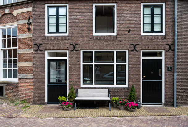Hattem, Gelderland, The Netherlands, 07 14 2022 - Traditional facades of decorated houses - Valokuva, kuva