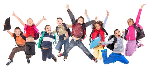 Schoolgaande kinderen springen - Foto, afbeelding