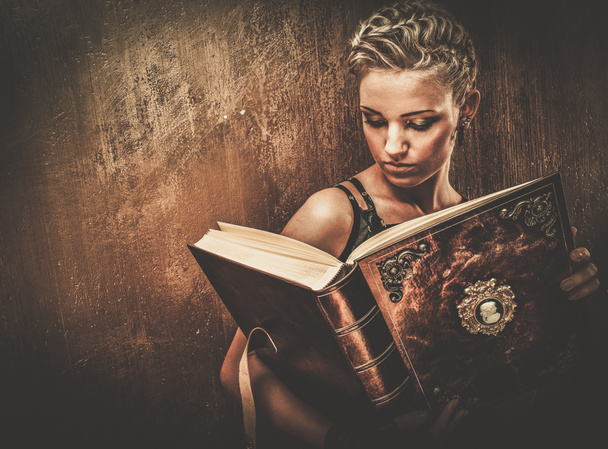 Steampunk girl with a book - Photo, Image