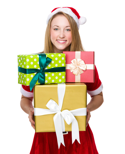 Mulher de Natal com muitas caixas de presente
 - Foto, Imagem