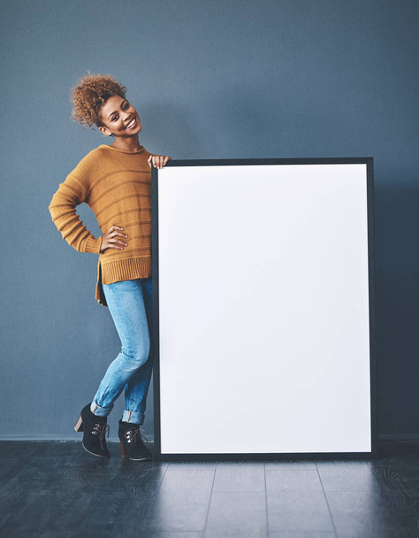 Sign, board and copyspace being held by a beautiful young woman for an advert. Attractive, smiling and happy female standing with a blank announcement to voice opinion. Lady with an empty poster - Foto, immagini