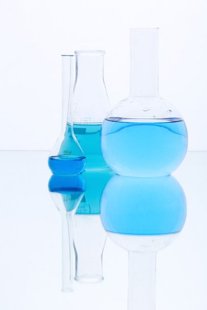 Flasks with blue liquid - Φωτογραφία, εικόνα