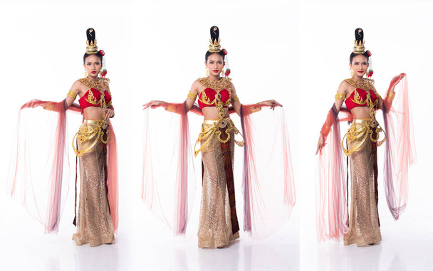 Beautiful Asian Woman wear Thai Traditional Costume as Thailand National Wedding Dress with gold decorative Fashion Items, white isolated, full length body - Valokuva, kuva