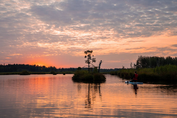 Beautiful morning at the Kemeru Tirelis Swamp in Latvia. Magical sunrise in the morning over the swamp. Latvian nature. - Foto, immagini
