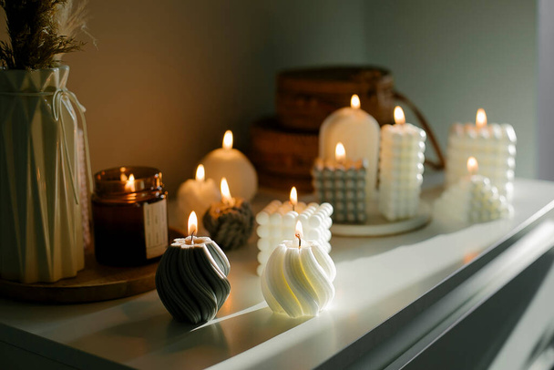 Beautiful composition with grey and white babble candles for spa treatment or home interior. Zen and relax concept. - Foto, Bild