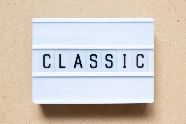 Lightbox with word classic on wood background - Foto, Bild