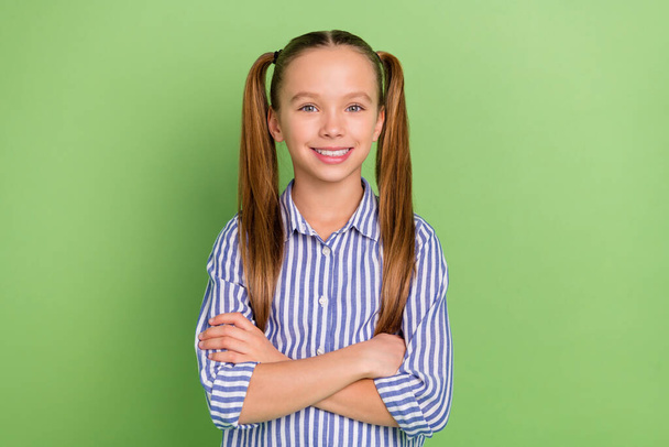Photo of positive modern kid girl cross arms look in camera wear striped clothes isolated bright color background. - Fotoğraf, Görsel
