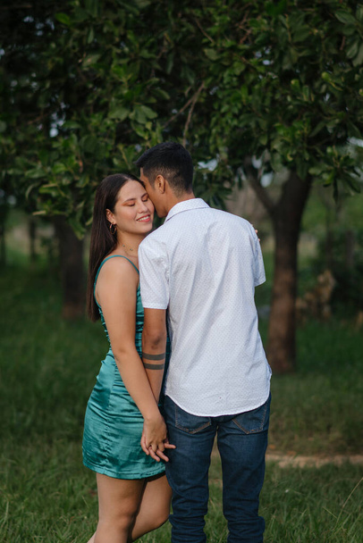 Latin couple showing all their love and happiness - 写真・画像