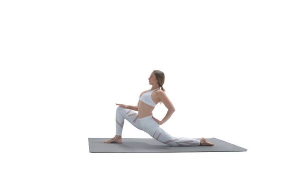 Молода атлетична приваблива жінка практикує йогу ізольовано на білому
 - Фото, зображення