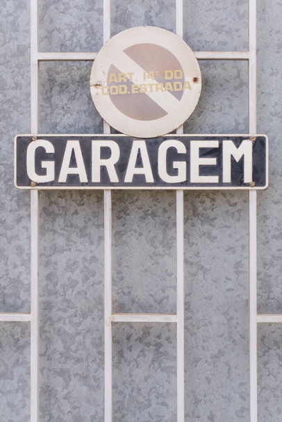 Retro sign garage on a metal grate background - Photo, image