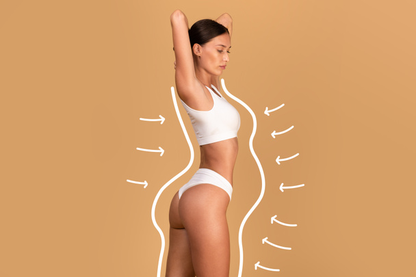 Liposuction concept. Drawn outlines with arrows around fit lady in white underwear, slender woman with perfect figure posing over beige studio background, collage - Foto, Imagem