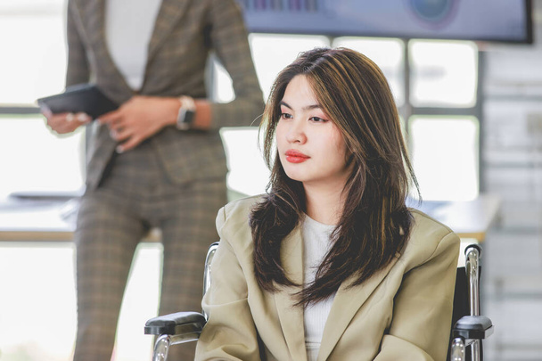 Closeup shot of Asian pretty happy cheerful  female businesswoman intern trainee in casual suit sitting smiling f in company office - Fotografie, Obrázek
