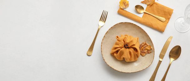 Beautiful autumn table setting on white background with space for text - Zdjęcie, obraz