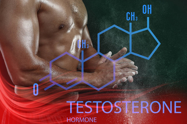 Young muscular man and structural chemical formula of testosterone hormone on dark background - Fotoğraf, Görsel
