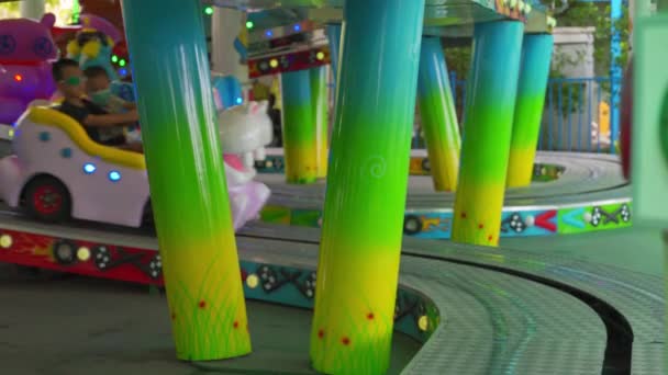 The rides in the playground in the children's park are in operation - 映像、動画