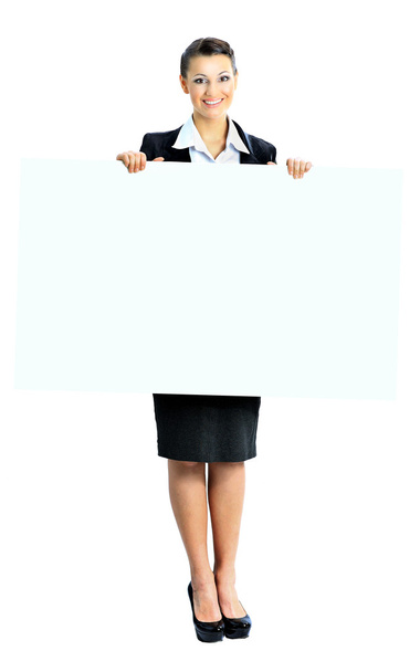 Beautiful business woman with a white banner. Isolated on a white background. - Фото, изображение
