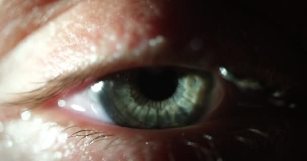 Closeup macro eye opening beautiful blue gray green iris natural beauty. Laser vision correction concept - Video